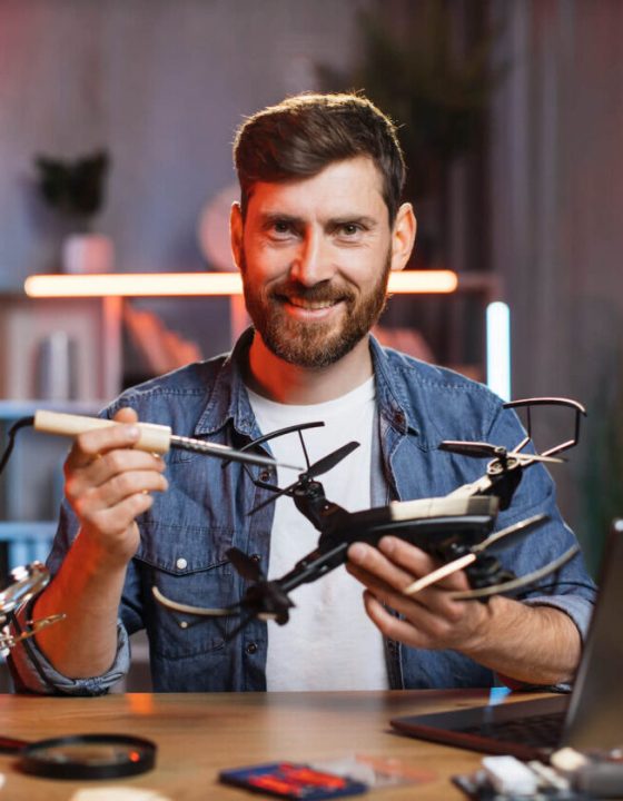 happy-smiling-caucasian-man-using-soldering-iron-f-2021-09-04-08-13-33-utc-e1697778801370.jpg